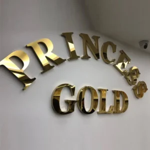 Non-illuminated gold mirror stainless steel 3D channel letters Princess Gold interior wall sign
