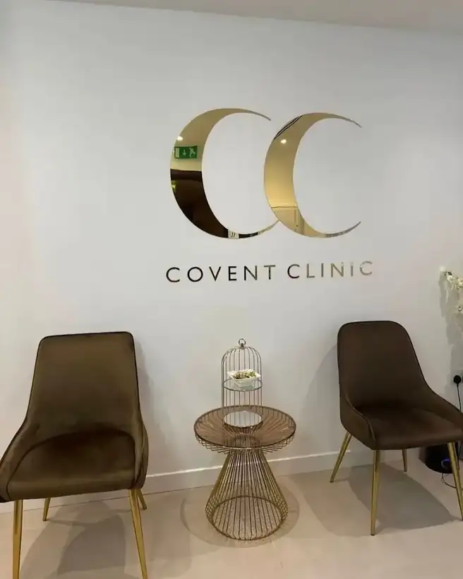 Covent Clinic reception wall in Dublin with a mirror gold CC logo and COVENT CLINIC letters, made and installed by AdsyUp