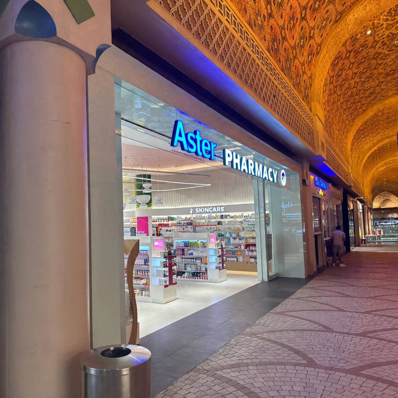 Aster Pharmacy illuminated 3D shopfront letters seen from the side