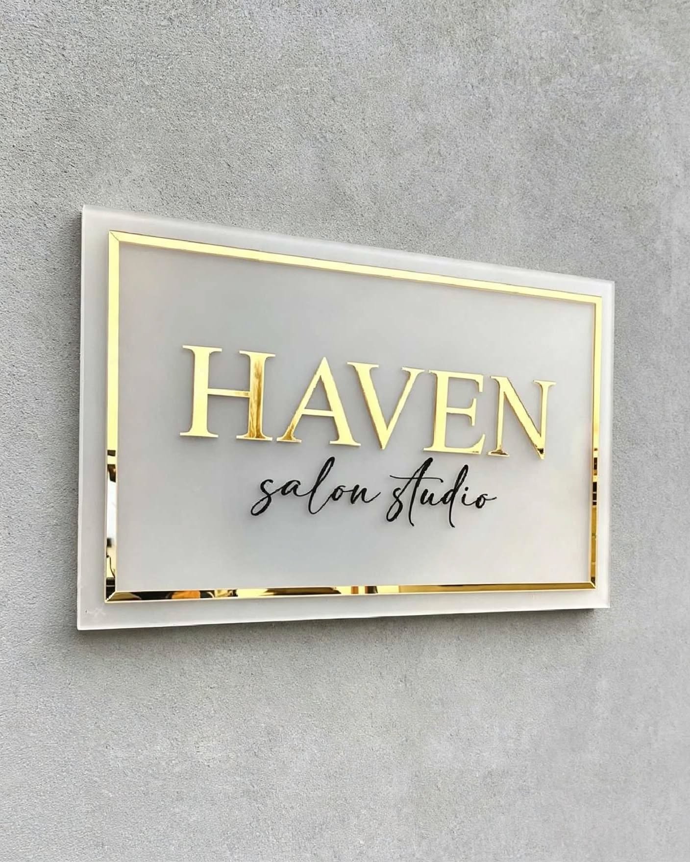 Frosted acrylic wall panel with gold mirror border, gold mirror 3D letters and black script lettering