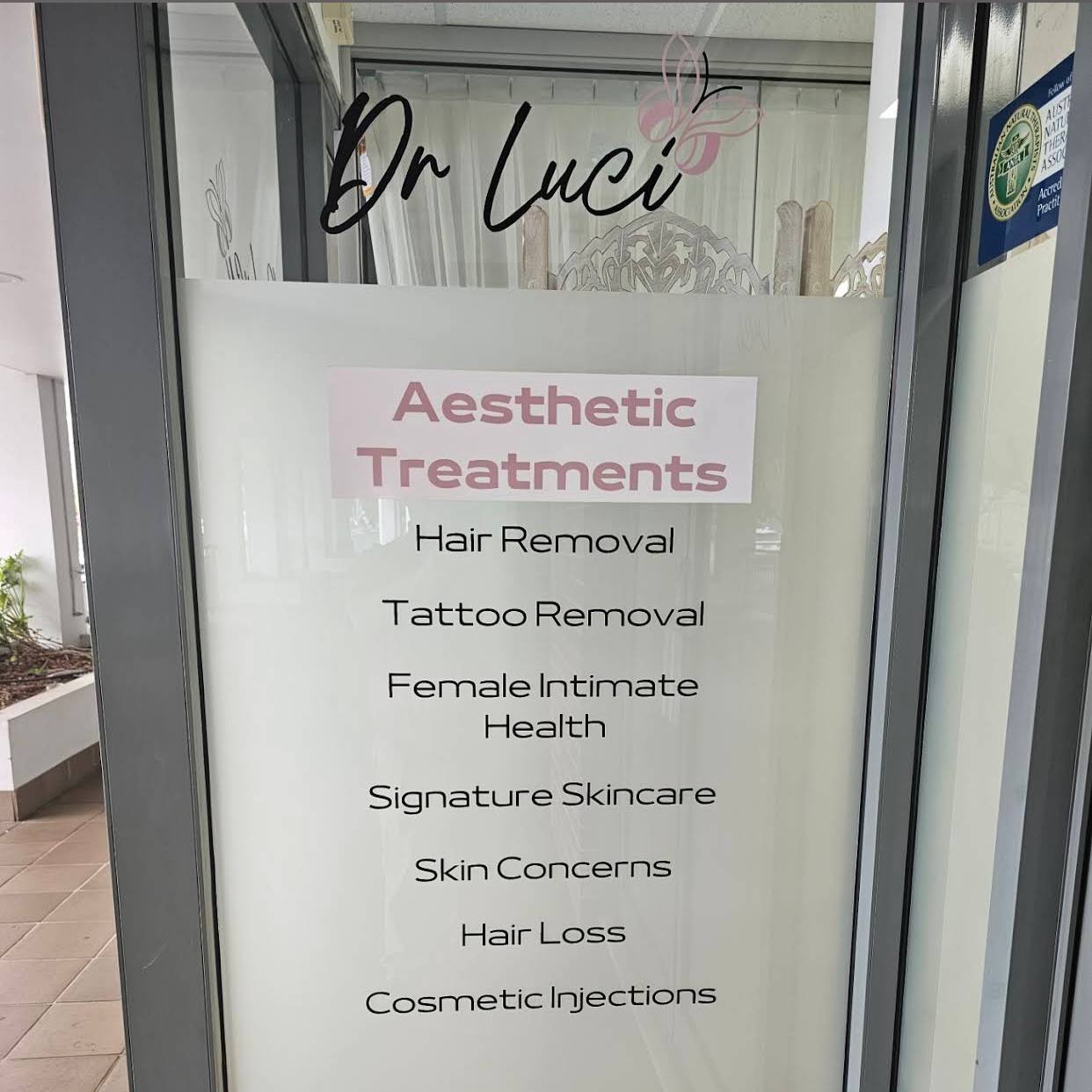 Lettering and text in frosted film on a glass door