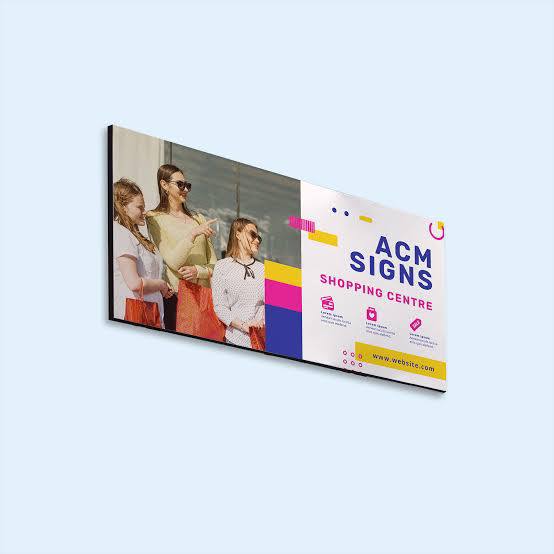 Wall-mounted ACM sign with printed shopping centre design