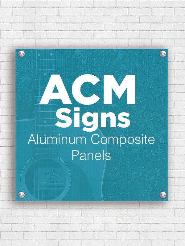 ACM sign panel mounted on a white brick wall